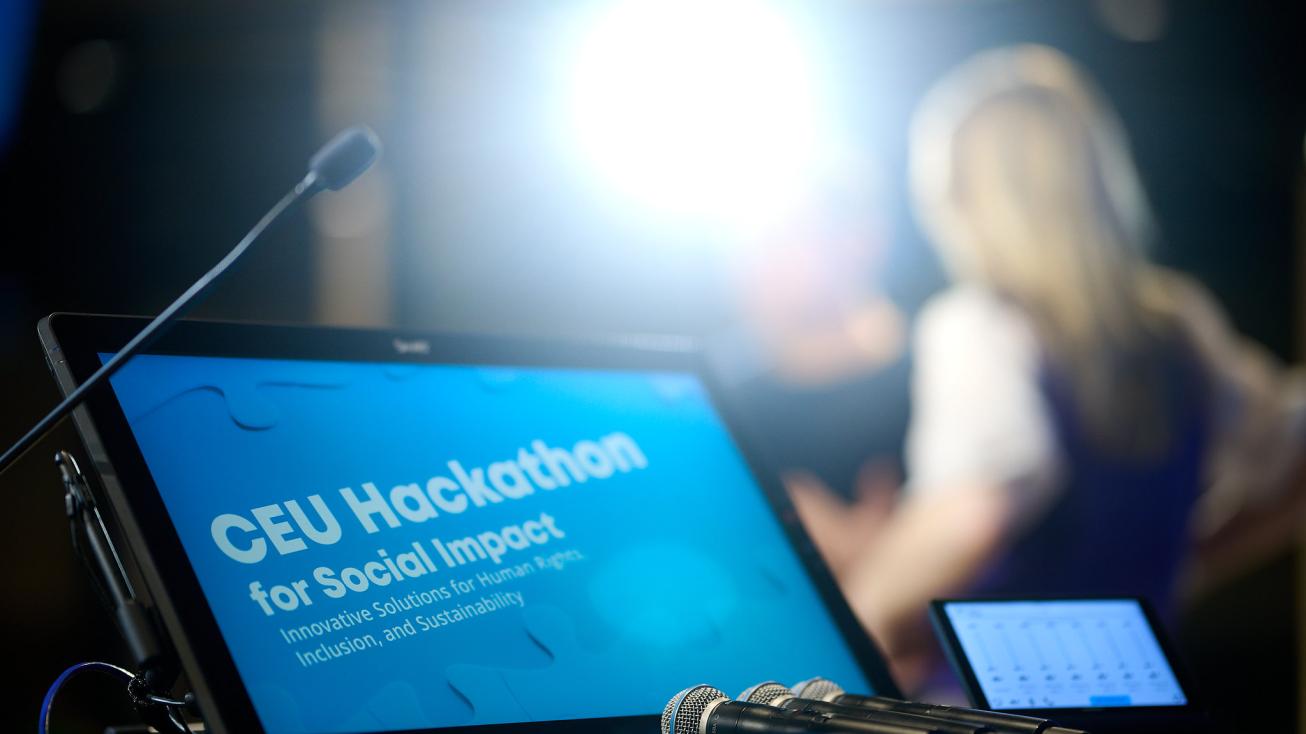 a CEU Hackathon opening day pulpits - screen and a microphone   